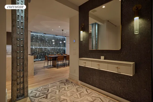 a view of a patio with dining table and chairs