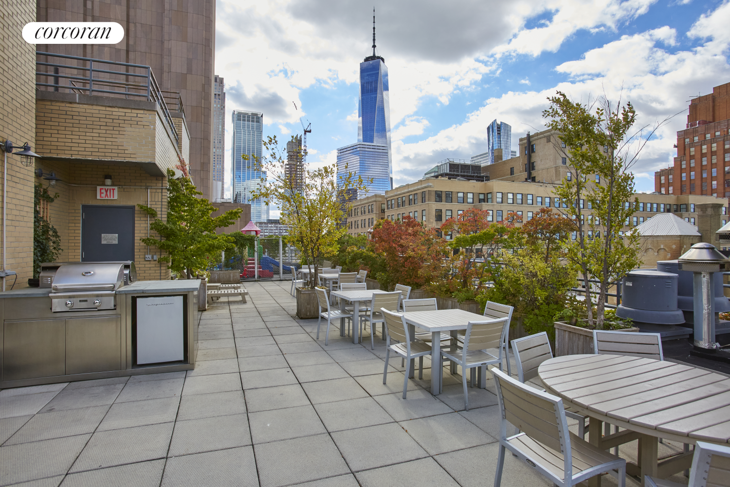 66 Leonard Street, Unit 12A Manhattan, NY 10013 - Photo 23 of 27 a view of a patio with dining table and chairs
