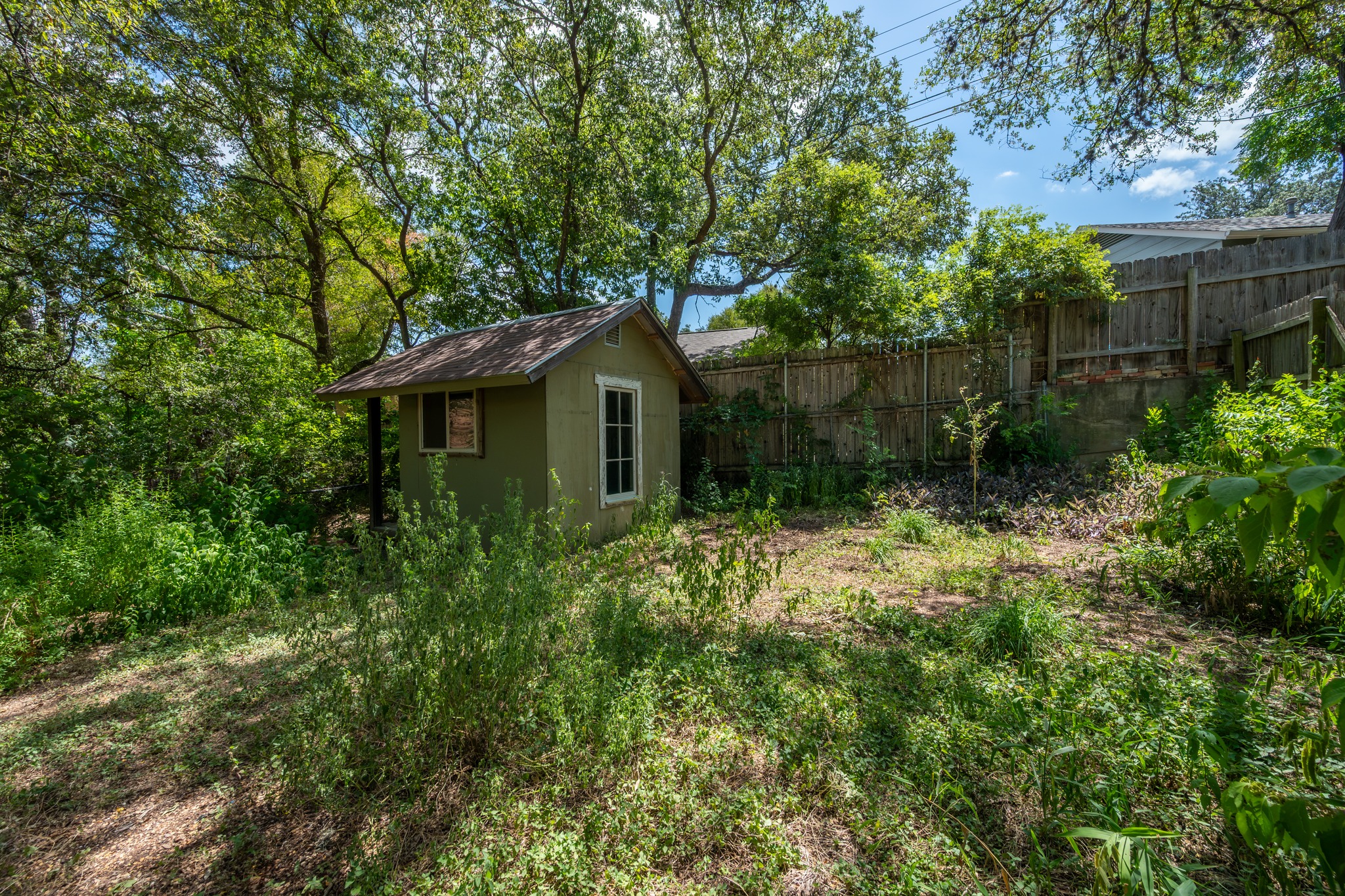3403 Clawson Road Austin, TX 78704 - Photo 17 of 38 To add to the practicality, a convenient detached building is set at the rear of the property.