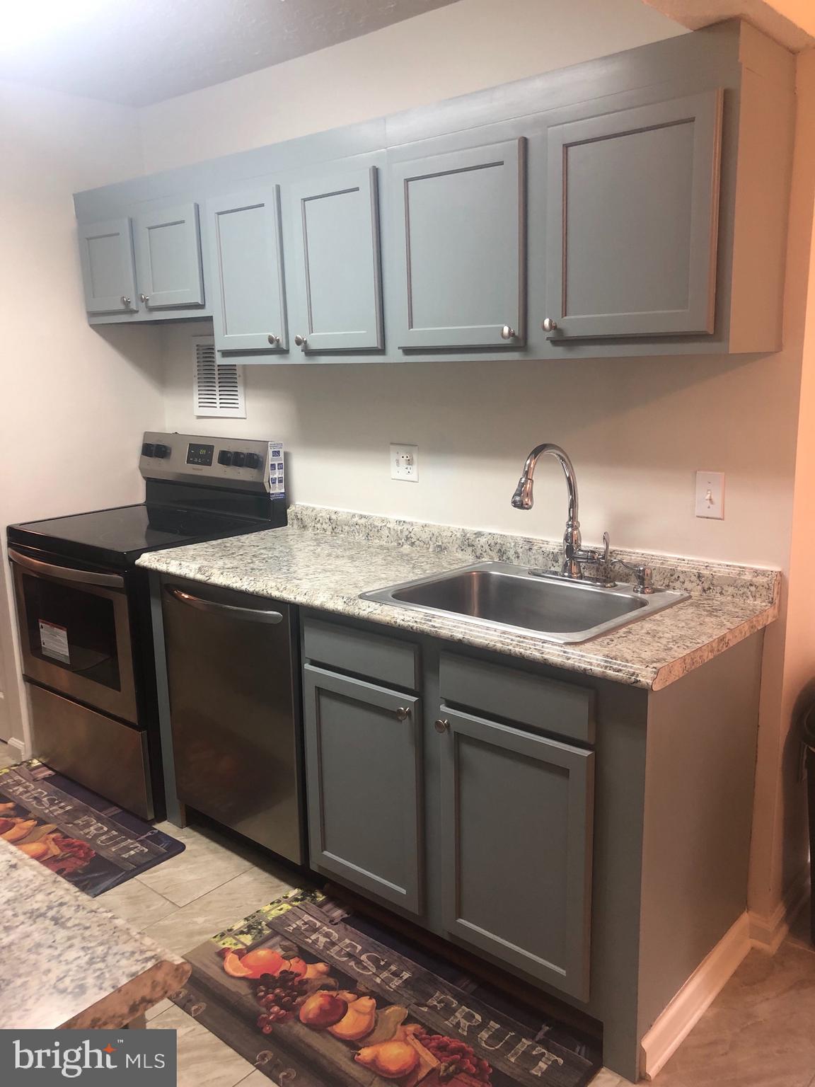 8015 Mandan Road, Unit T2 Greenbelt, MD 20770 - Photo 2 of 32 Updated kitchen and cabinets