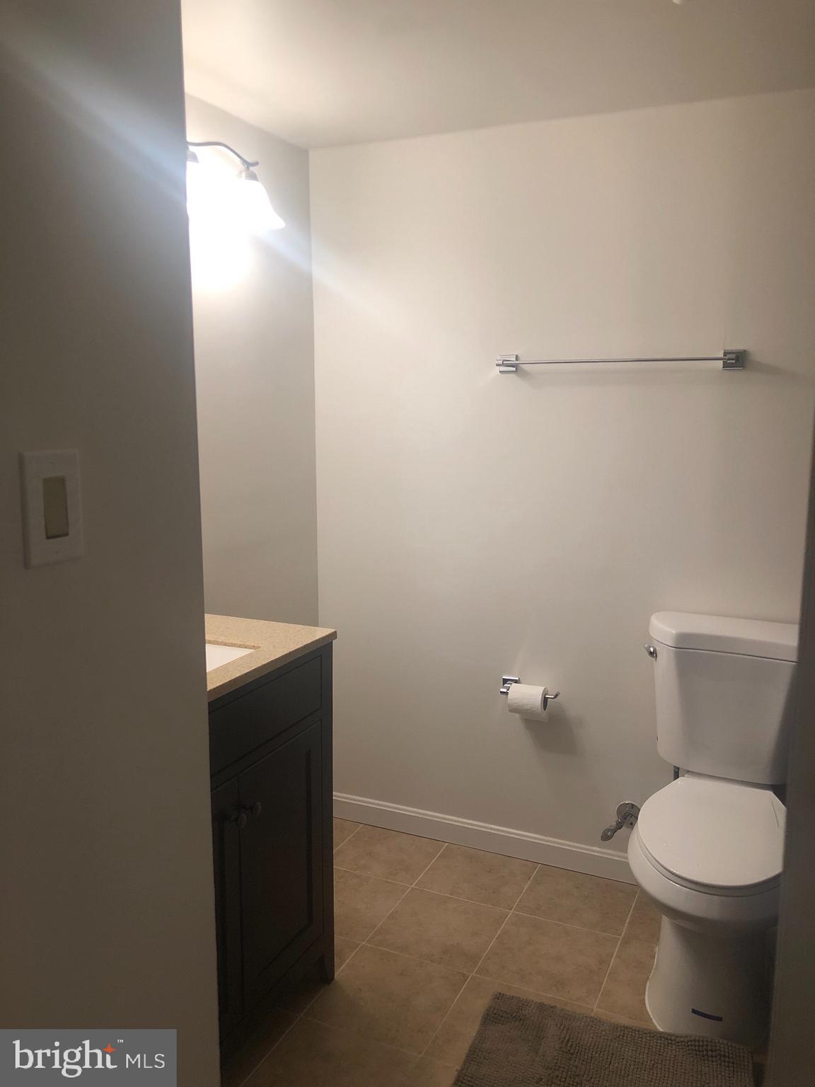 8015 Mandan Road, Unit T2 Greenbelt, MD 20770 - Photo 15 of 32 Hall Full Bathroom