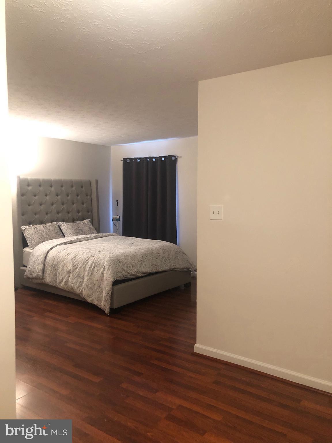 8015 Mandan Road, Unit T2 Greenbelt, MD 20770 - Photo 21 of 32 Master Bedroom
