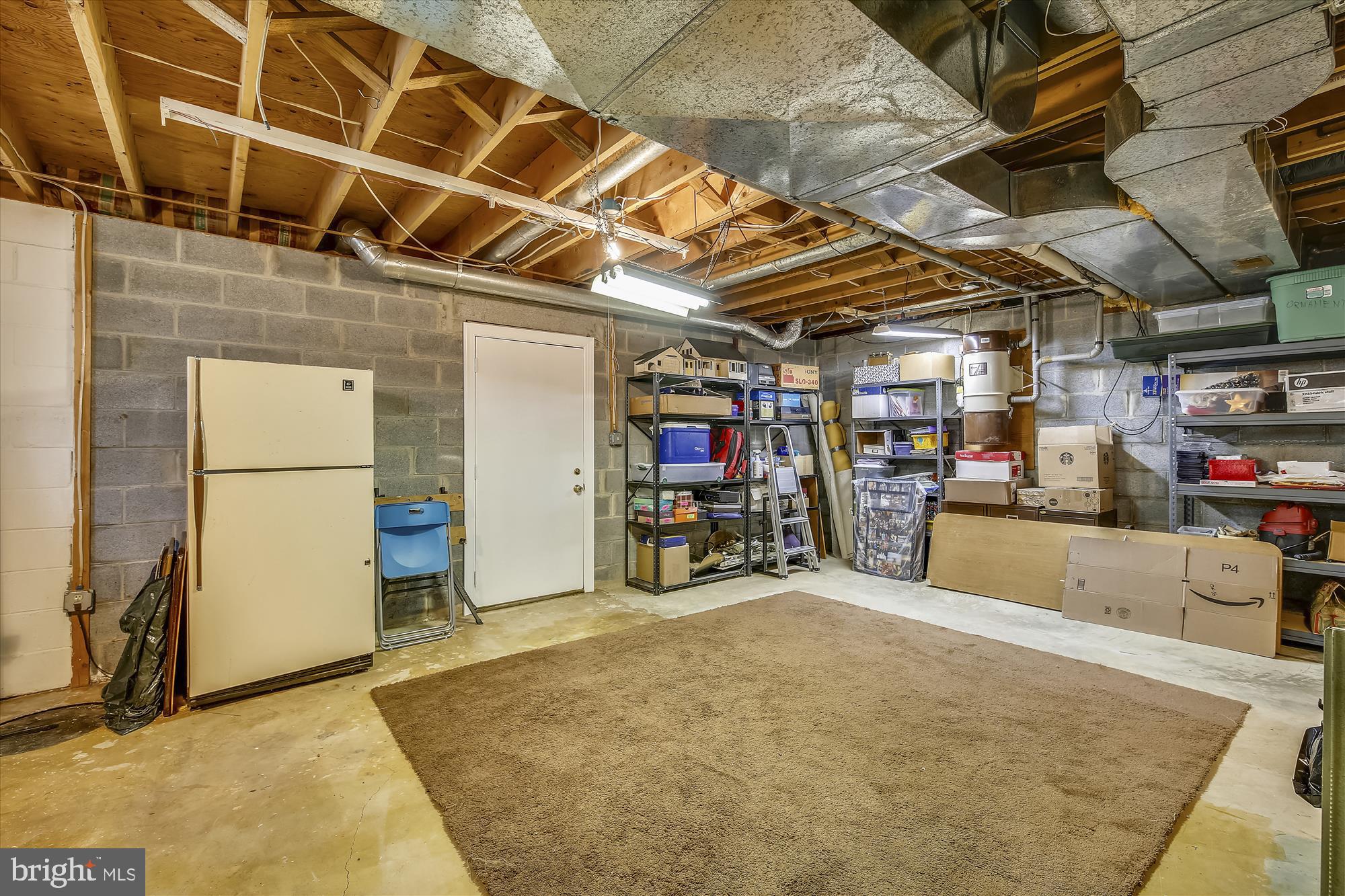5308 Sangamore Road Bethesda, MD 20816 - Photo 49 of 50 Utility and storage room lower level. Outside Exit