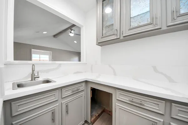 a bathroom with a sink and a toilet
