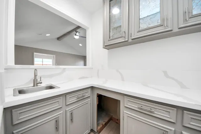 a bathroom with a sink and a toilet