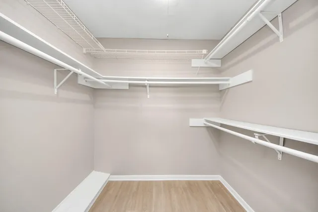 a view of an empty walk in closet