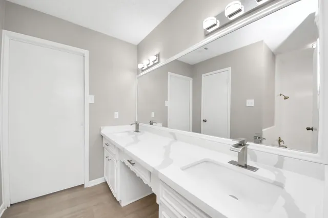 a view of a house with a street