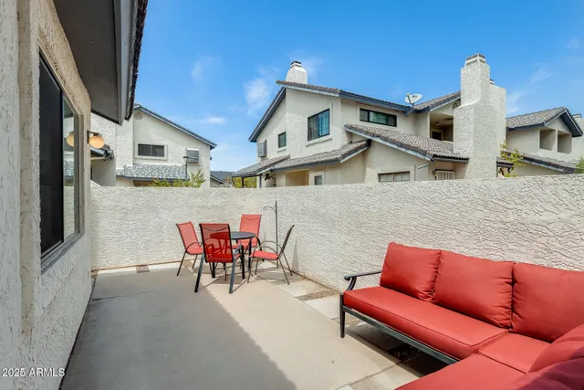a view of a house with a door and wooden floor