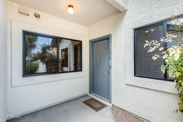 a front view of a house with patio