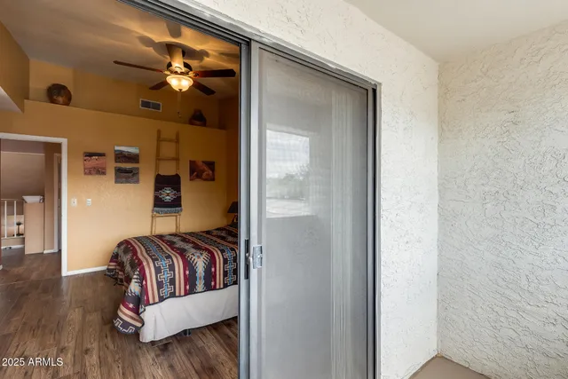 a view of a livingroom with furniture and wooden floor