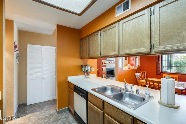 a bedroom with furniture and a wooden floor