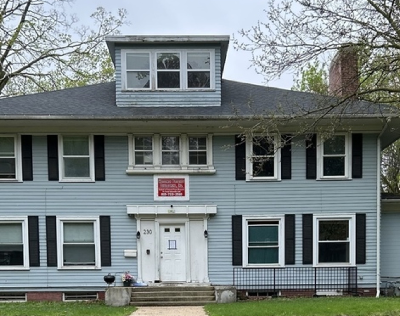 230 Augusta Avenue DeKalb, IL 60115 - Photo 1 of 1 a front view of a building with windows