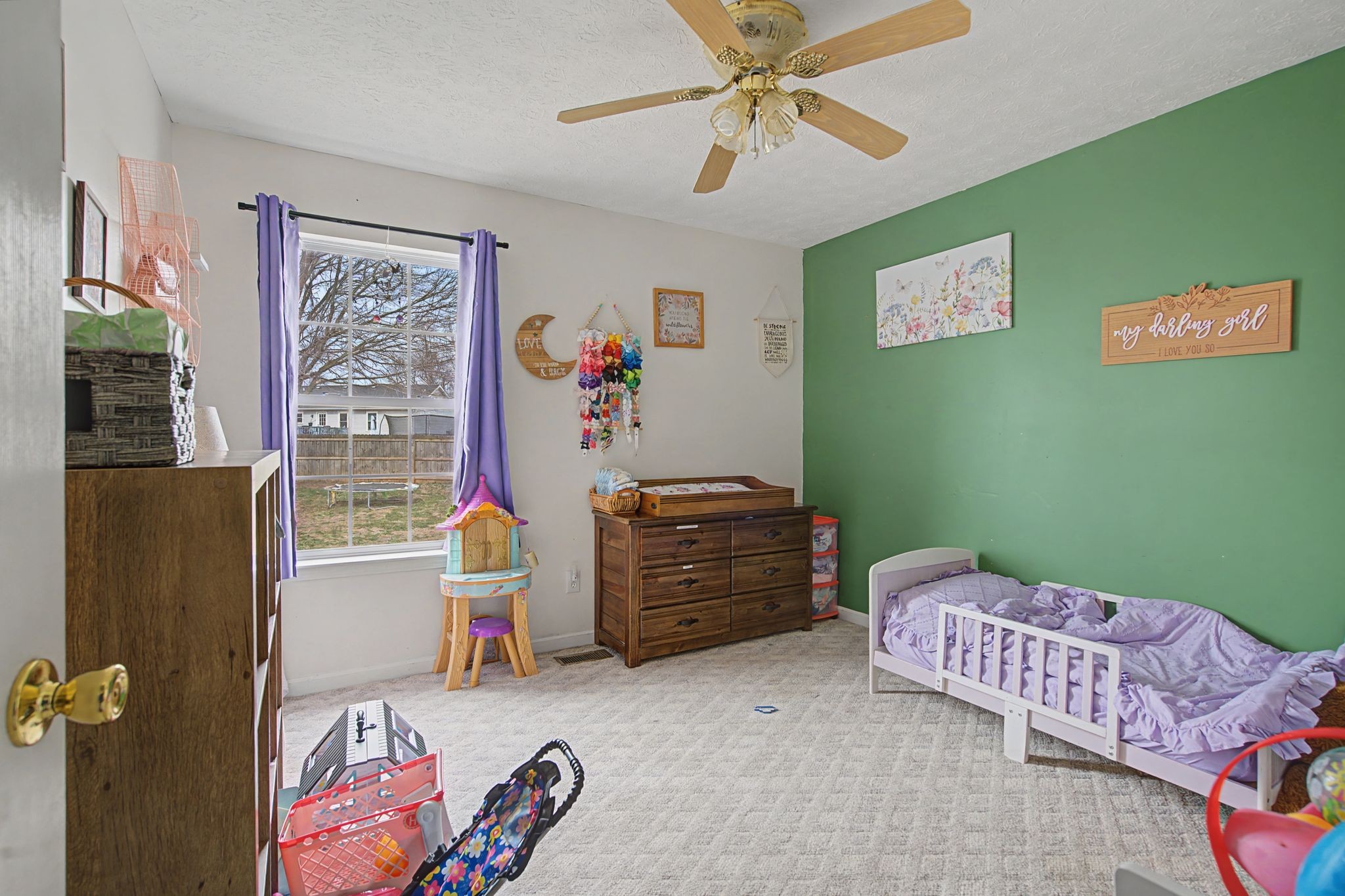 105 Cora Street Portland, TN 37148 - Photo 13 of 31 a bedroom with furniture and a window