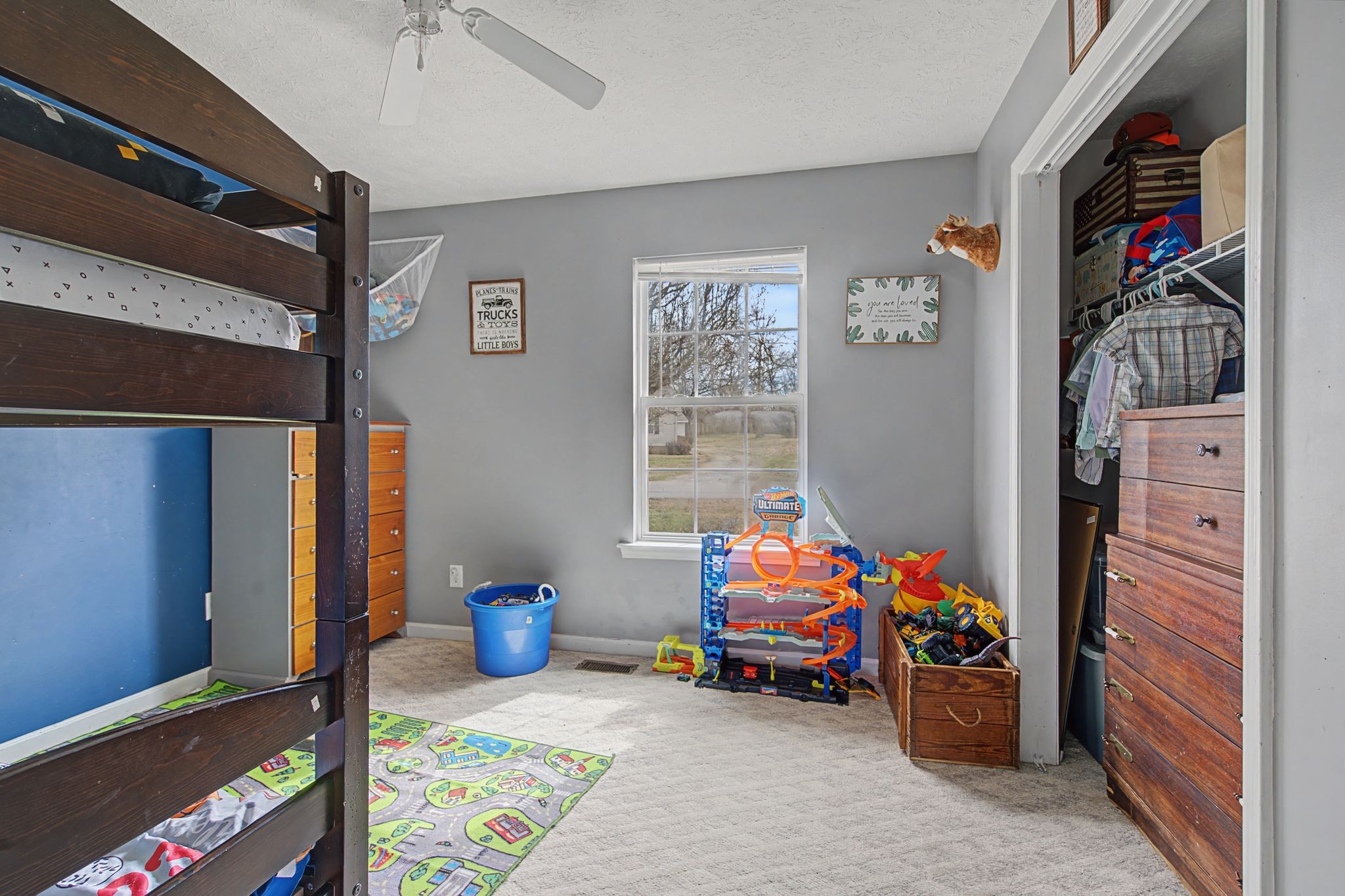 105 Cora Street Portland, TN 37148 - Photo 15 of 31 a children room with furniture and a fan