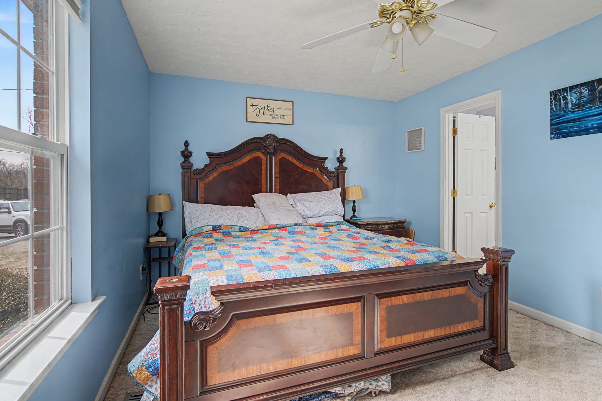 105 Cora Street Portland, TN 37148 - Photo 17 of 31 a bedroom with a bed and window