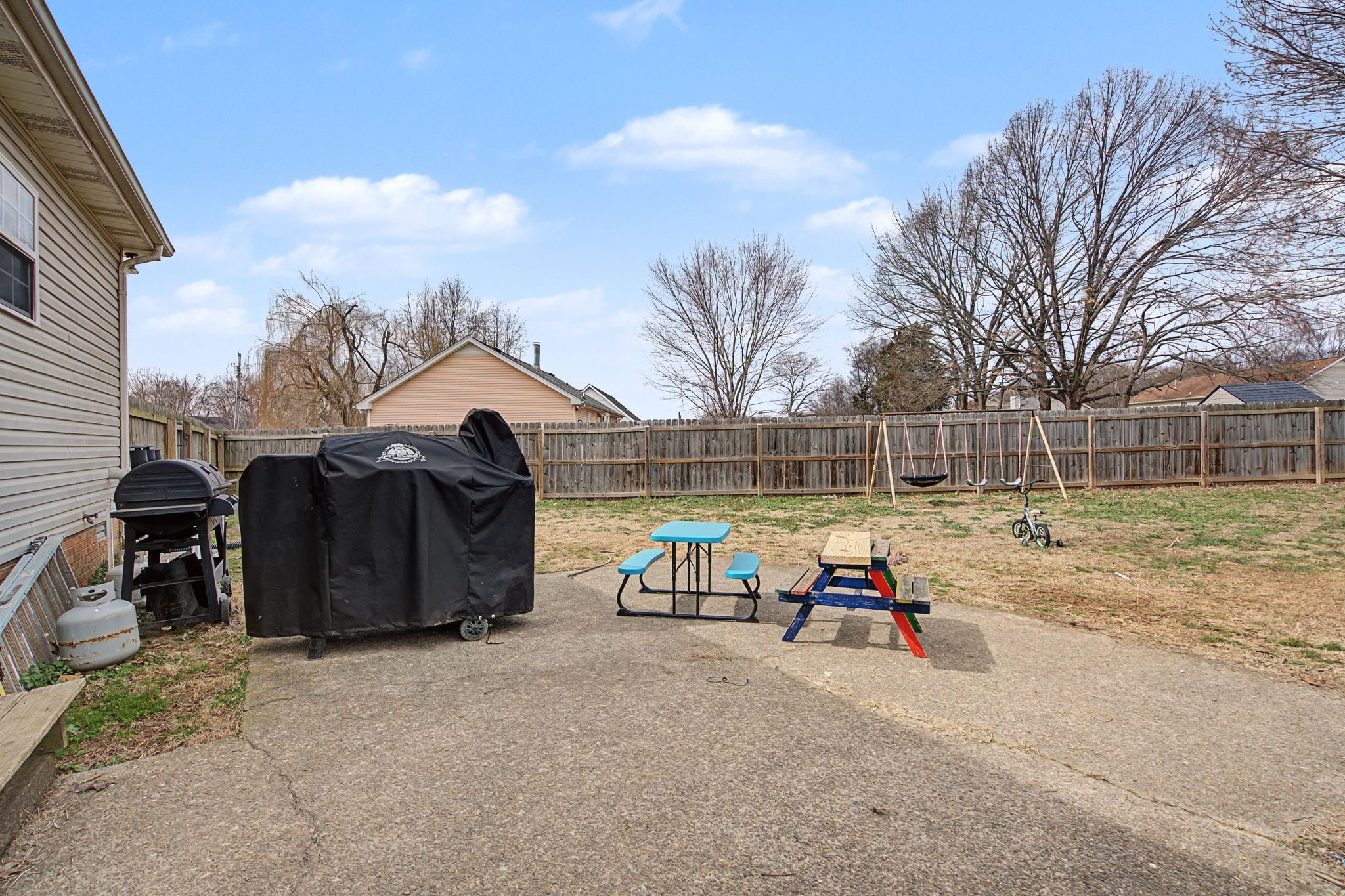 105 Cora Street Portland, TN 37148 - Photo 26 of 31 a view of a back yard of a house