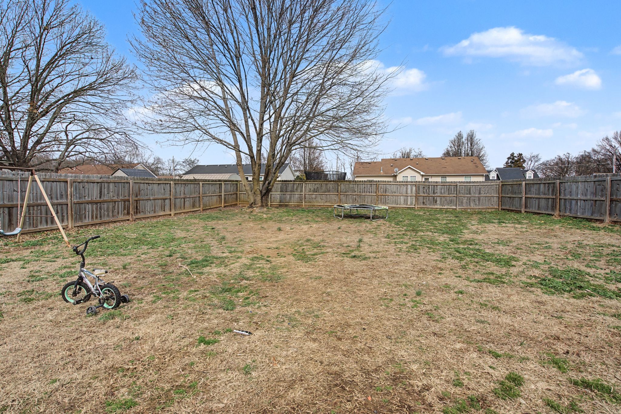 105 Cora Street Portland, TN 37148 - Photo 28 of 31 a backyard of a house with lots of green space