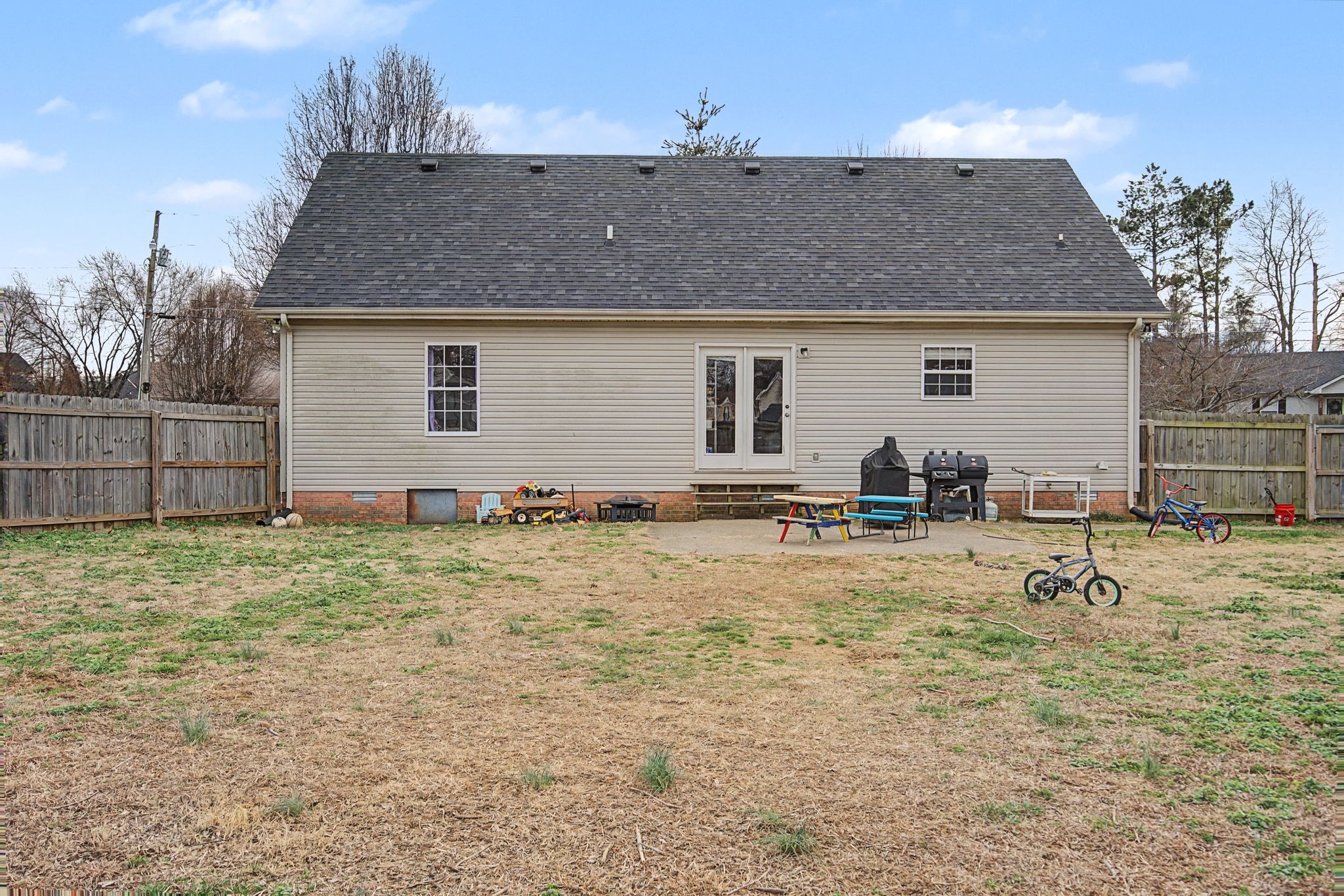 105 Cora Street Portland, TN 37148 - Photo 29 of 31 a view of a house with a yard