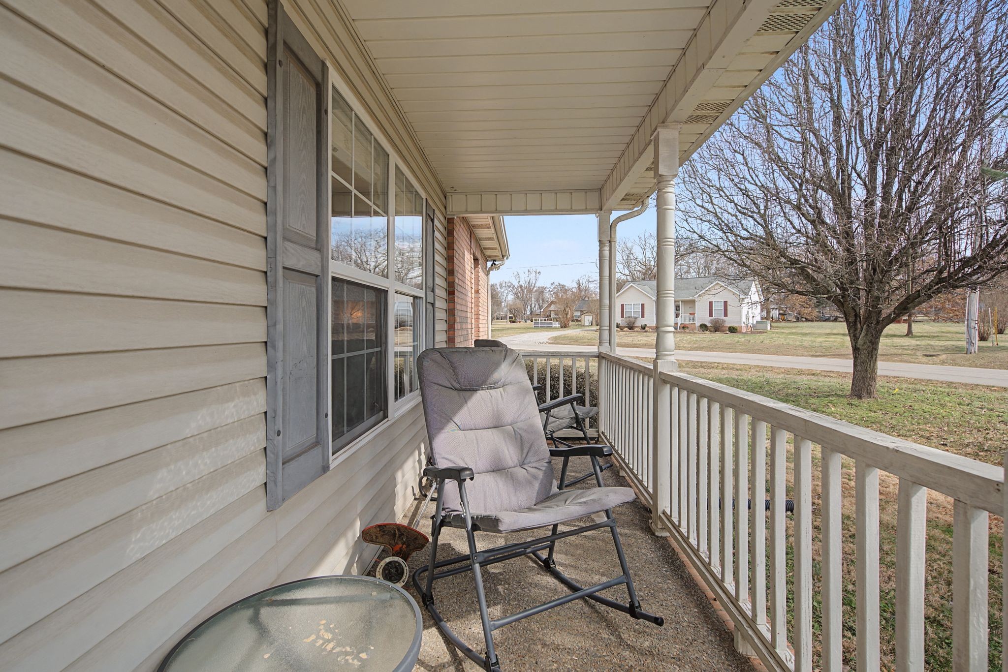 105 Cora Street Portland, TN 37148 - Photo 4 of 31 a view of a chairs and tables in balcony