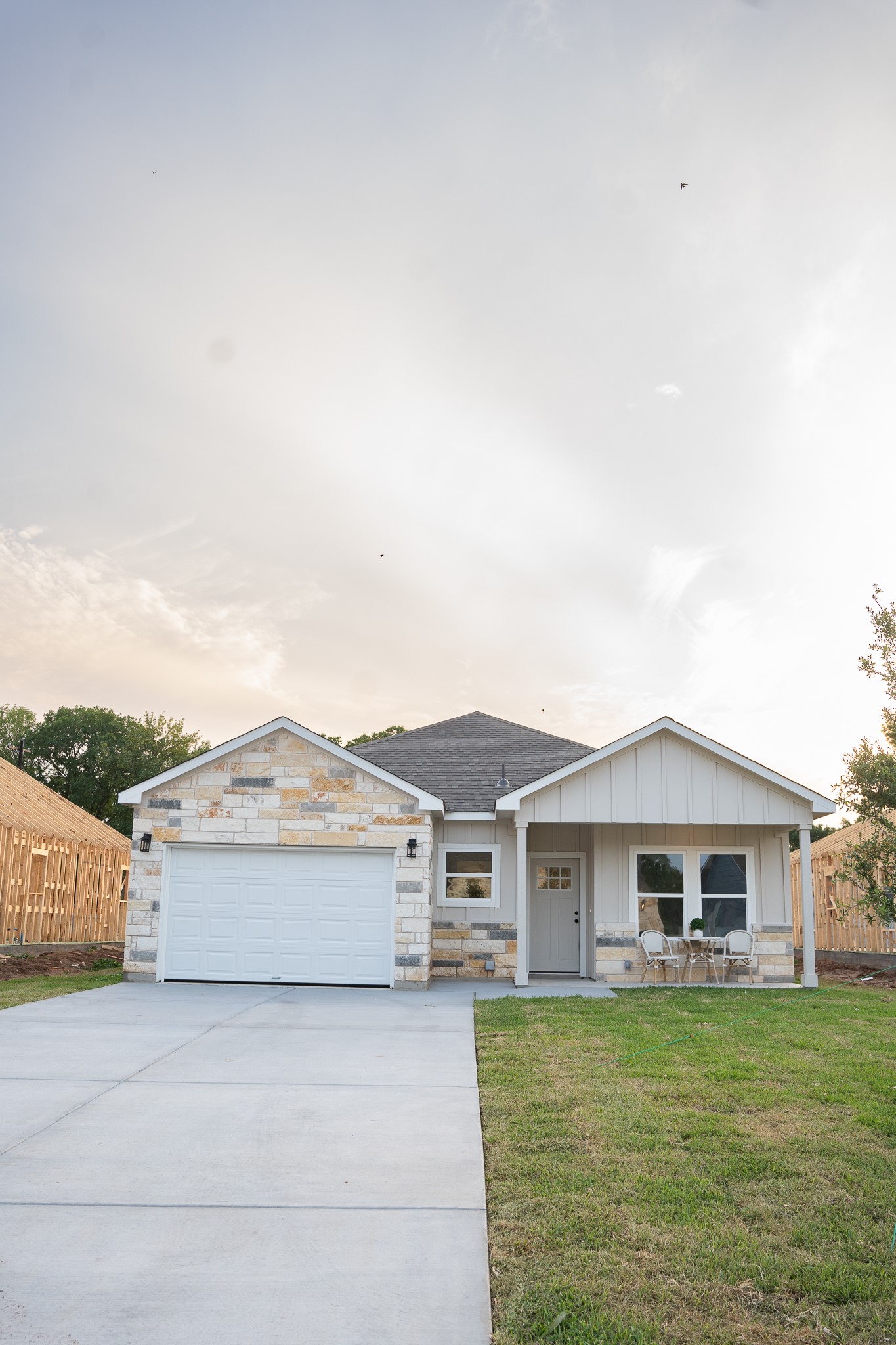 307 String Prairie Way Smithville, TX 78957 - Photo 5 of 34 a front view of a house with a garden and deck