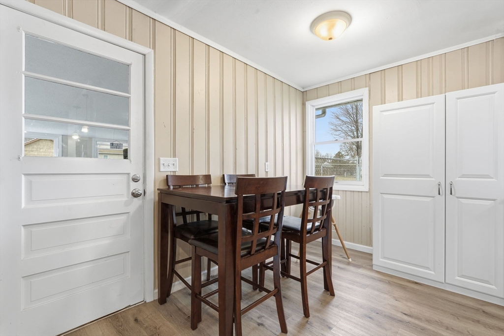 30 Jerilis Drive Springfield, MA 01119 - Photo 12 of 42 a view of a dining room with furniture and wooden floor