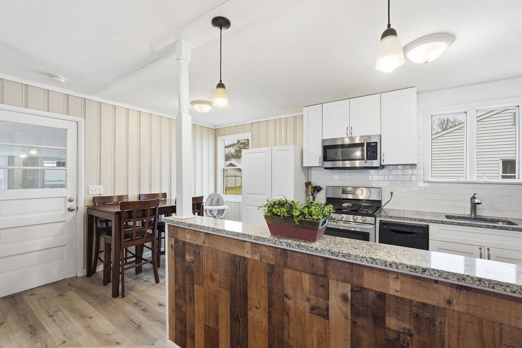 30 Jerilis Drive Springfield, MA 01119 - Photo 14 of 42 a kitchen with appliances cabinets and furniture