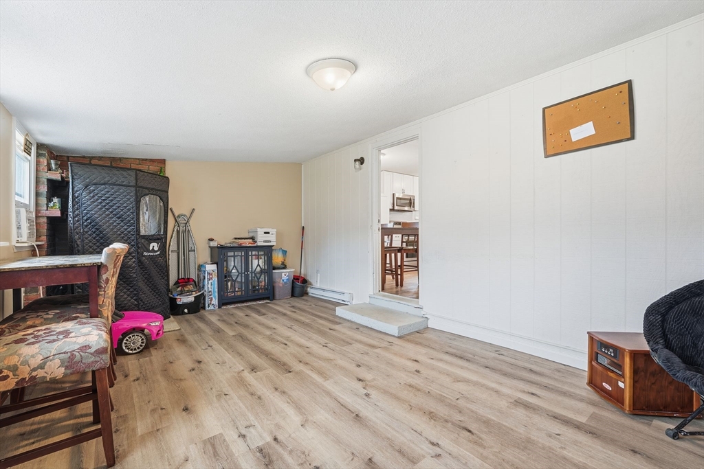 30 Jerilis Drive Springfield, MA 01119 - Photo 25 of 42 a view of a livingroom with furniture and storage