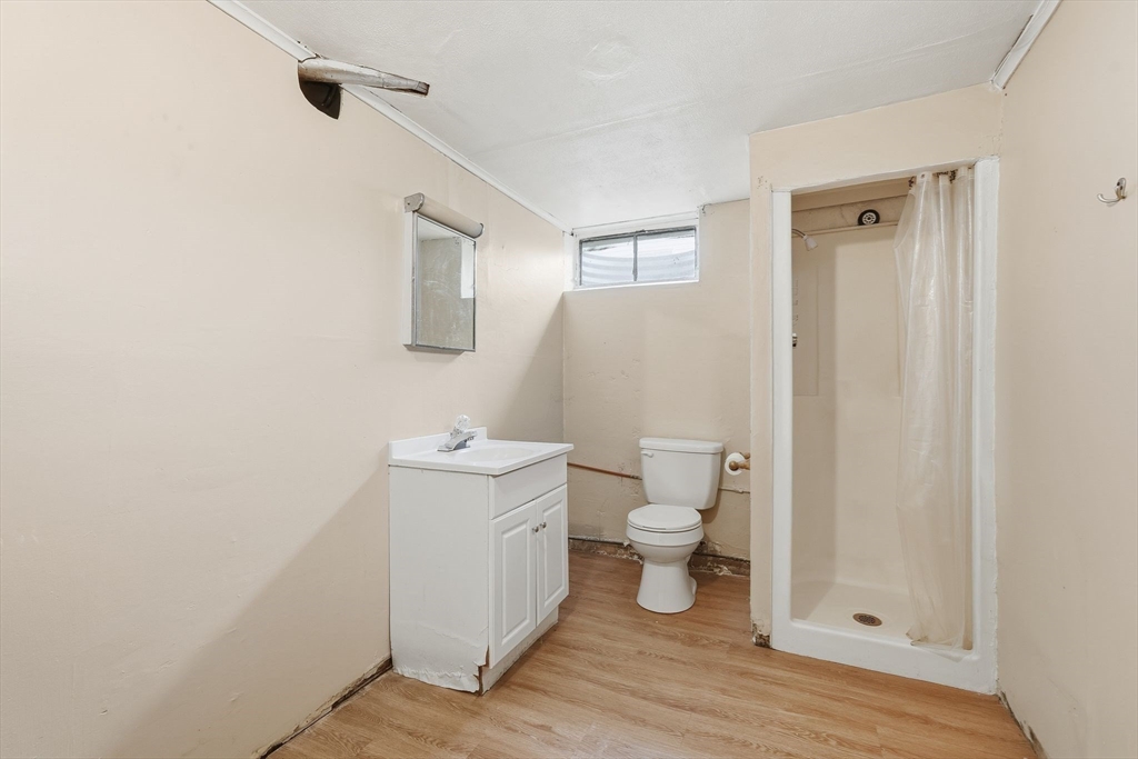 30 Jerilis Drive Springfield, MA 01119 - Photo 33 of 42 a bathroom with a toilet a sink and shower