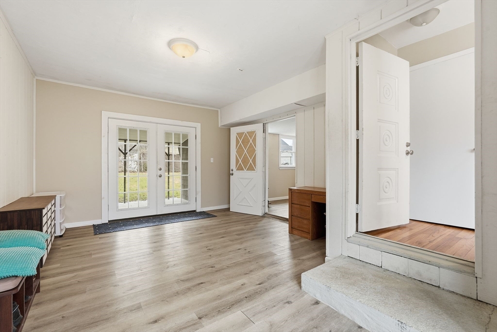 30 Jerilis Drive Springfield, MA 01119 - Photo 6 of 42 an empty room with wooden floor and windows