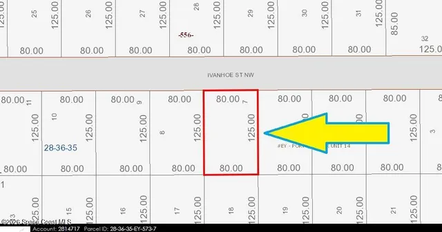 an aerial view of a house with a swimming pool
