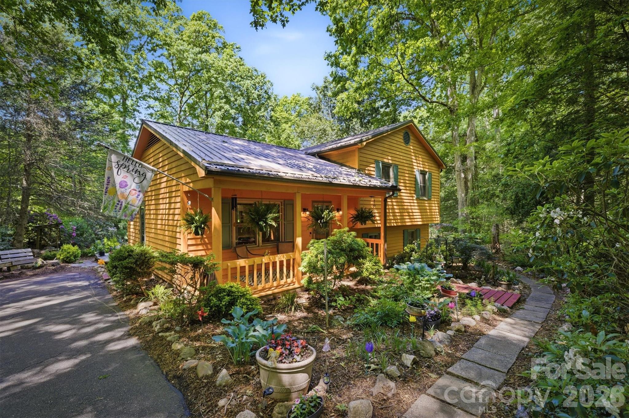 3432 Ridgewood Drive Morganton, NC 28655 - Photo 2 of 36 a front view of a house with garden