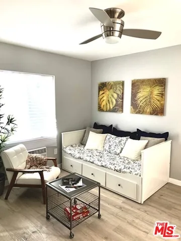 a living room with furniture and rug