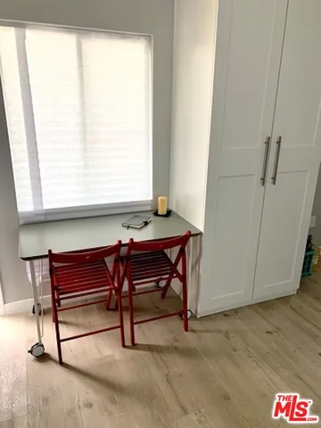 a living room with furniture and window