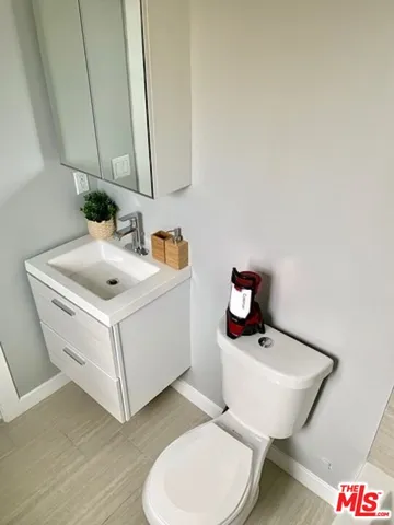 a bathroom with a bathtub and a toilet