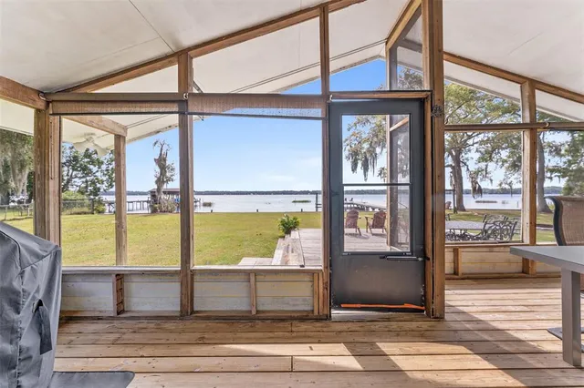 a view of living room with a large window