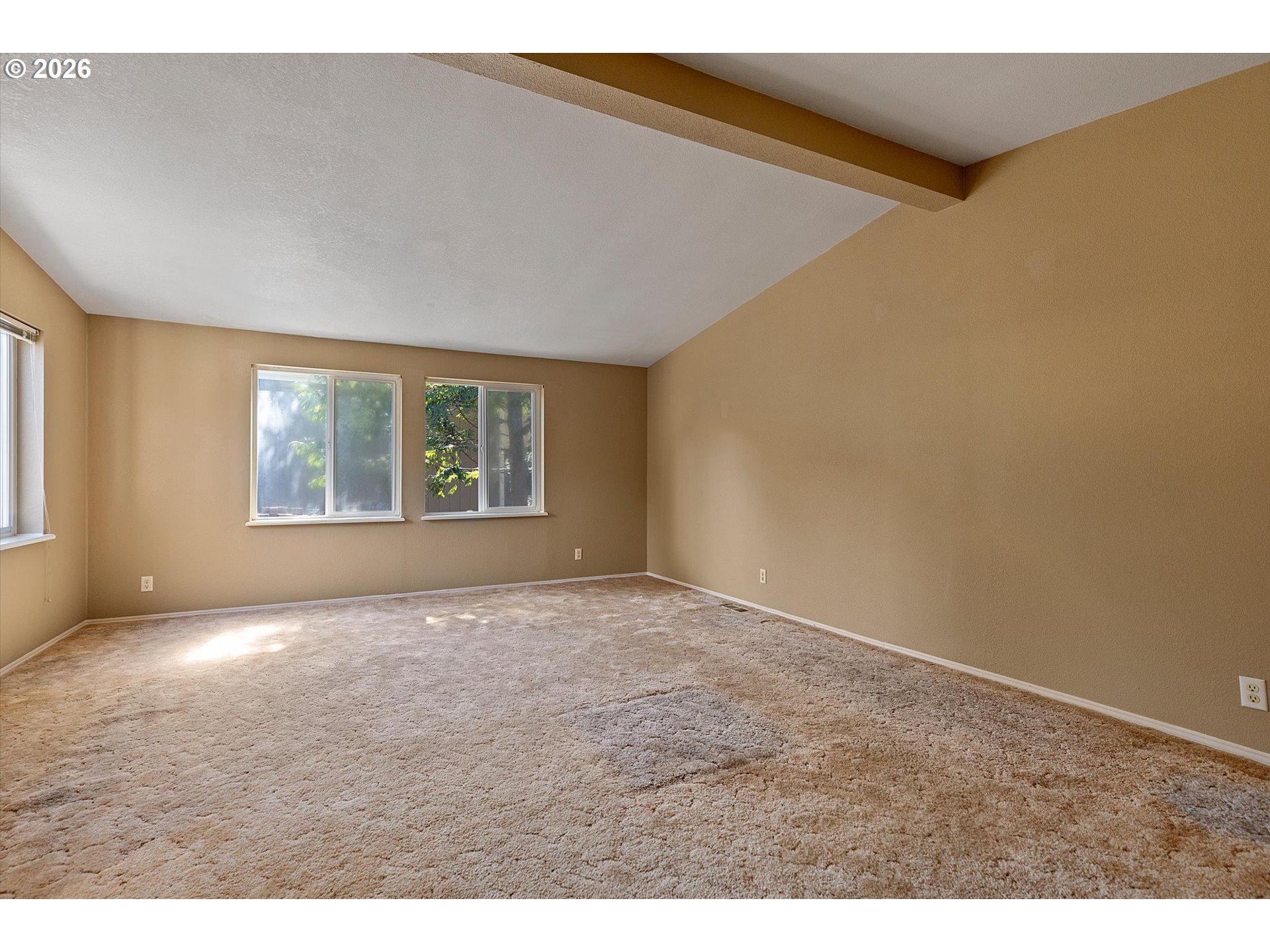 395 Seagrove Loop Lincoln City, OR 97367 - Photo 11 of 46 a view of an empty room with a window