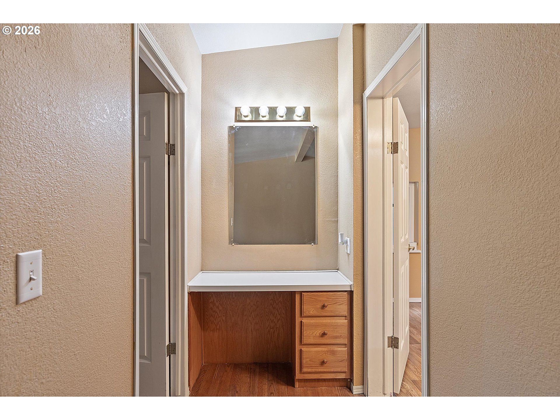 395 Seagrove Loop Lincoln City, OR 97367 - Photo 16 of 46 a bathroom with a sink and a mirror