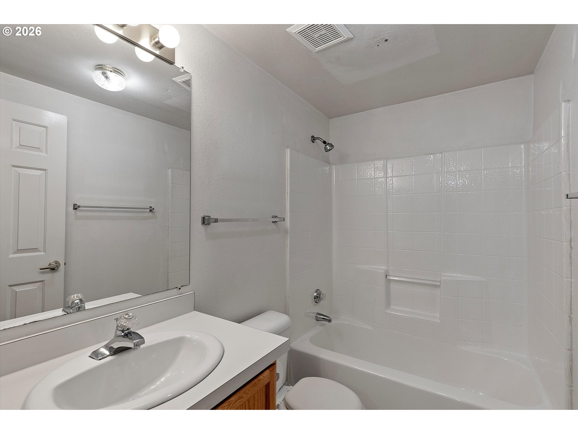 395 Seagrove Loop Lincoln City, OR 97367 - Photo 21 of 46 a bathroom with a sink and a mirror