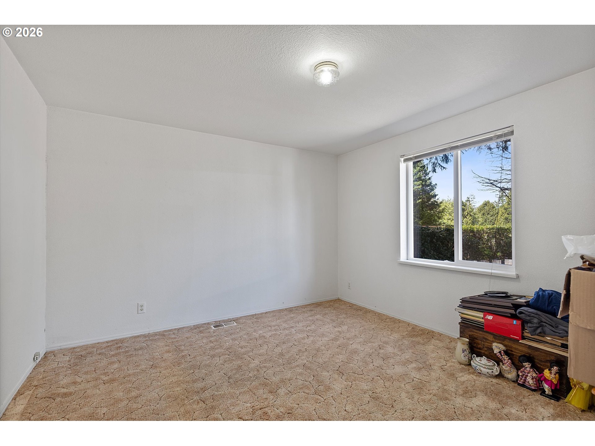 395 Seagrove Loop Lincoln City, OR 97367 - Photo 22 of 46 a living room with furniture and a window