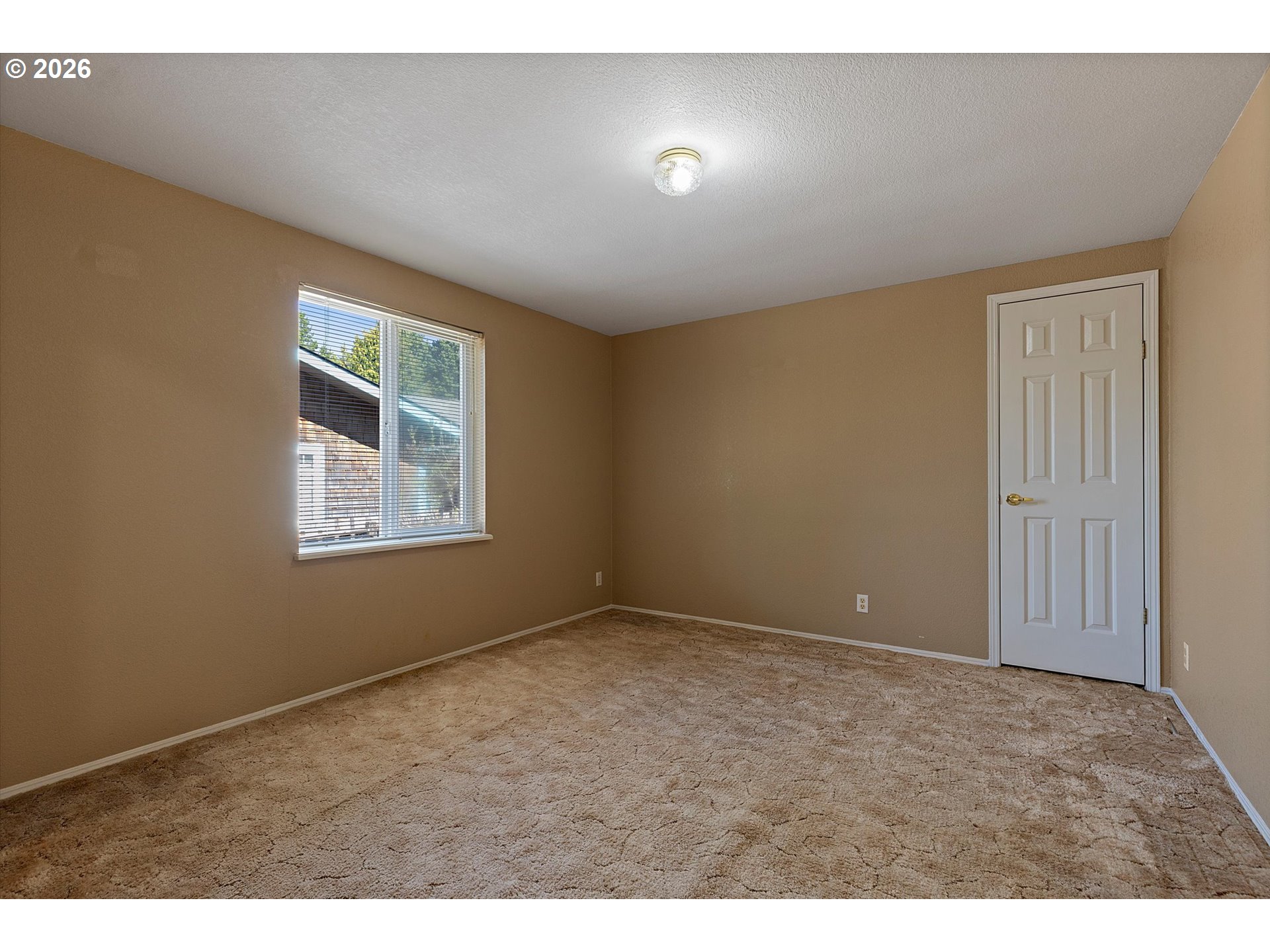 395 Seagrove Loop Lincoln City, OR 97367 - Photo 25 of 46 an empty room with windows