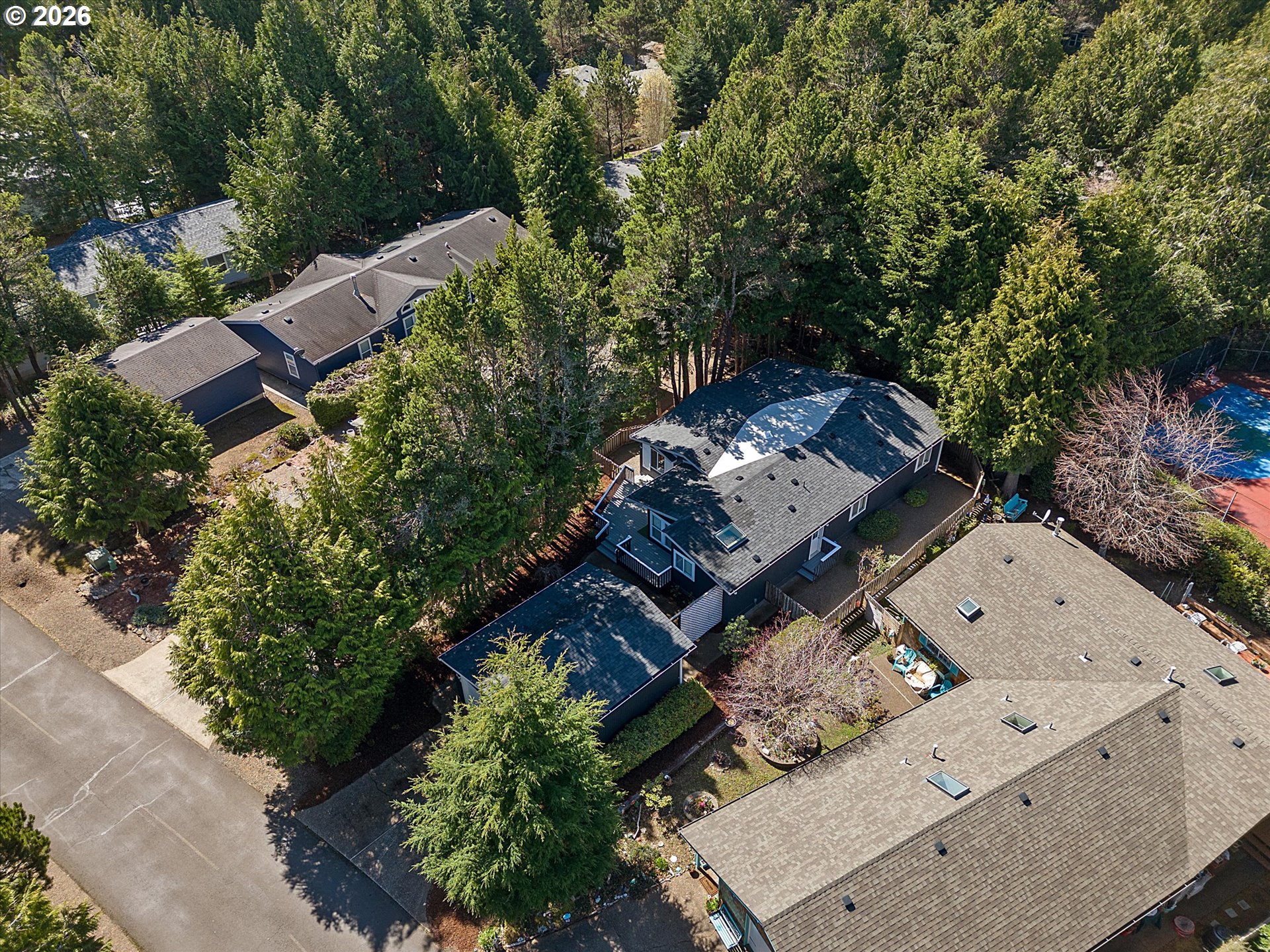 395 Seagrove Loop Lincoln City, OR 97367 - Photo 41 of 46 an aerial view of a house with a mountain