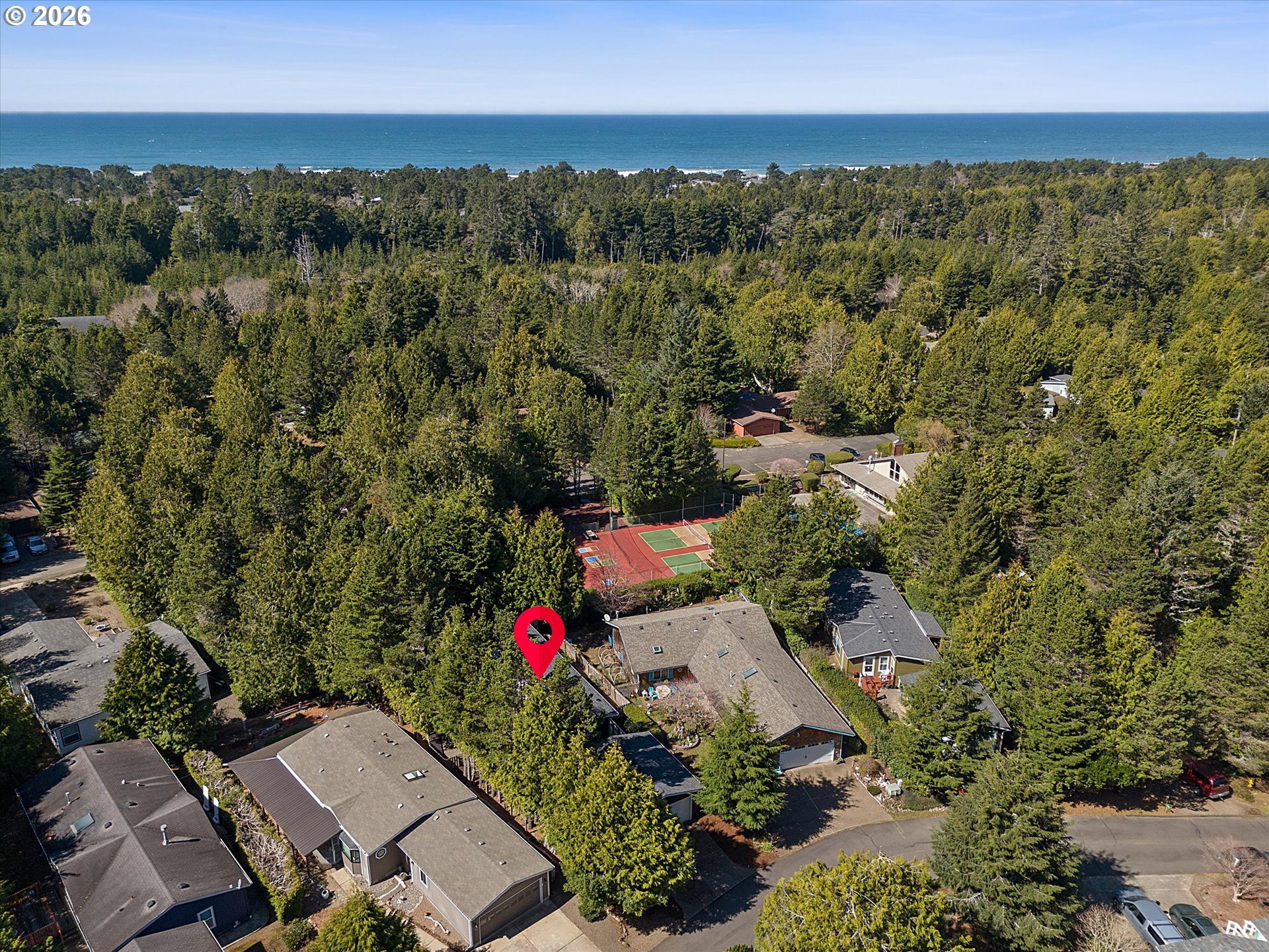 395 Seagrove Loop Lincoln City, OR 97367 - Photo 42 of 46 an aerial view of a houses with city view