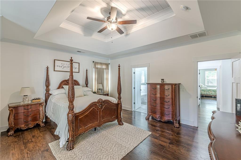 21 Lovell Road Temple, GA 30179 - Photo 36 of 77 a bed room with a bed and a ceiling fan