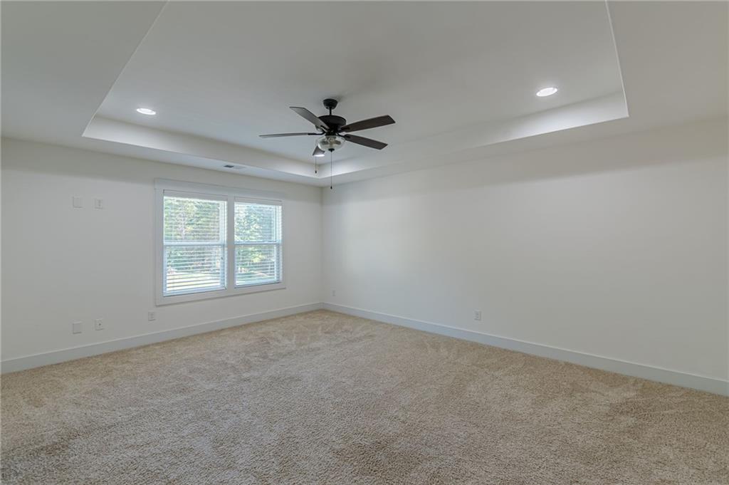 21 Lovell Road Temple, GA 30179 - Photo 45 of 77 an empty room with a window and a fan