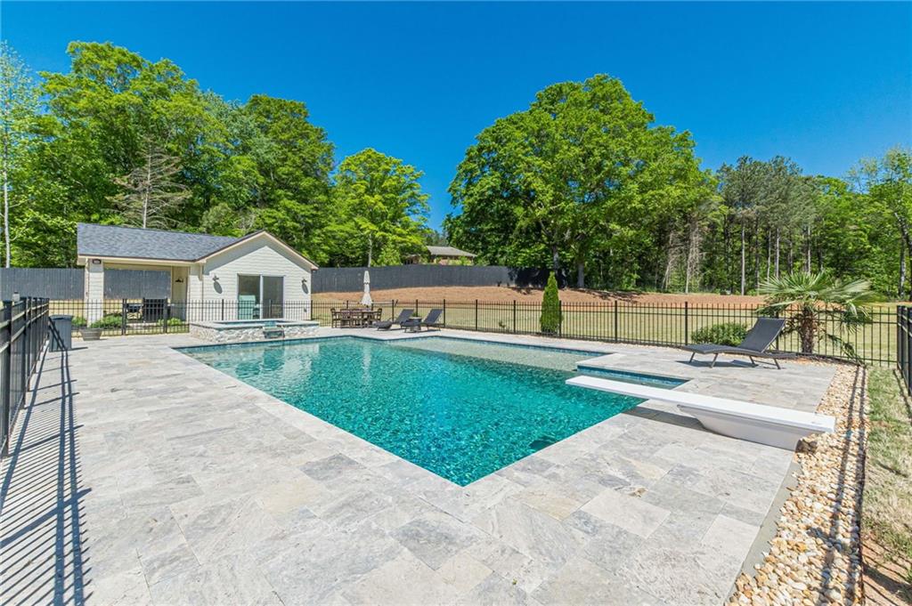 21 Lovell Road Temple, GA 30179 - Photo 57 of 77 a view of house with swimming pool and a yard