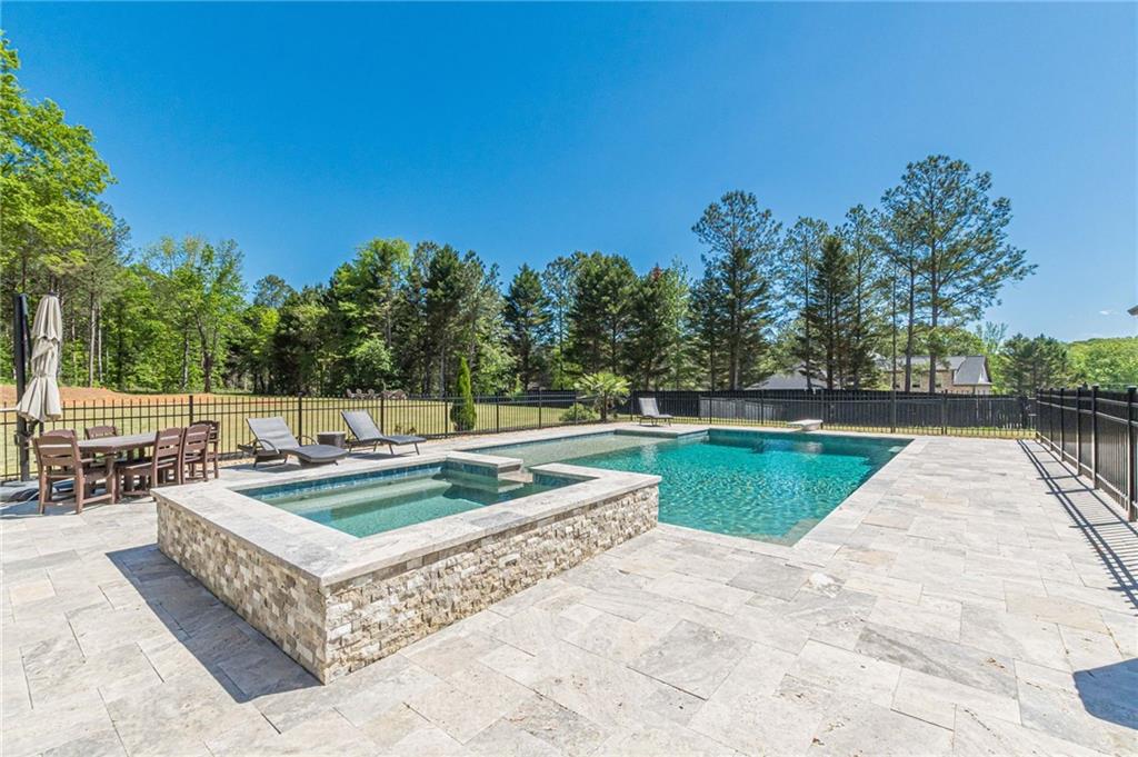 21 Lovell Road Temple, GA 30179 - Photo 59 of 77 a view of a swimming pool with a patio