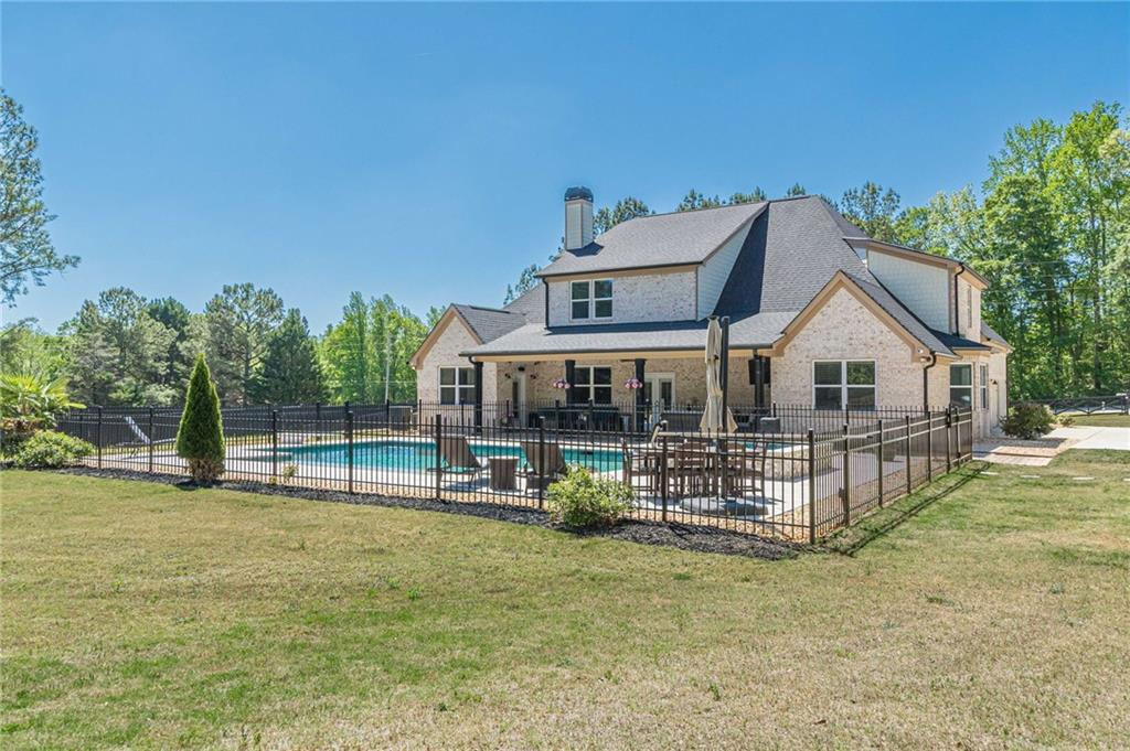 21 Lovell Road Temple, GA 30179 - Photo 67 of 77 a view of house with outdoor space and sitting area