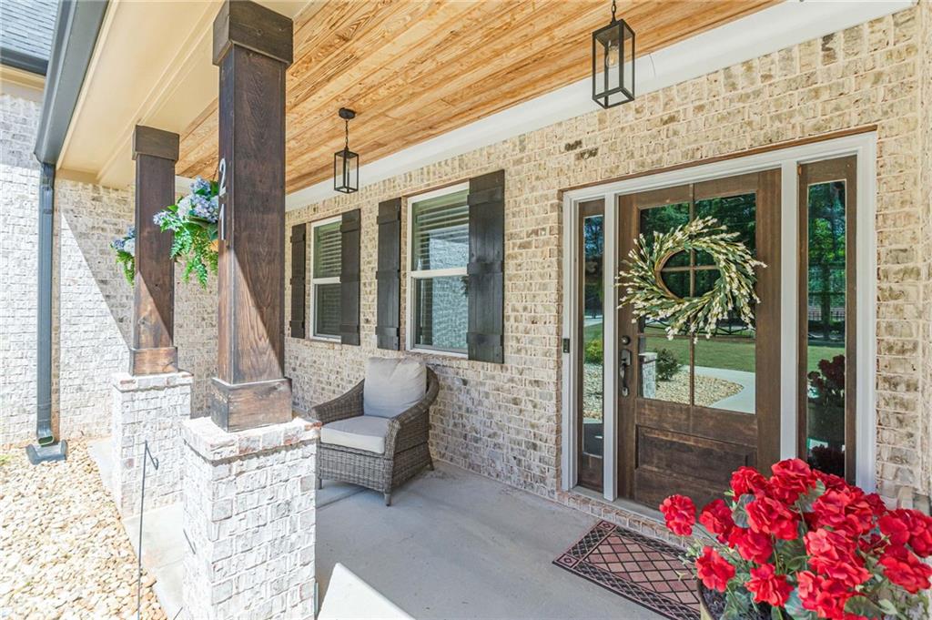 21 Lovell Road Temple, GA 30179 - Photo 7 of 77 a front view of a house with outdoor seating