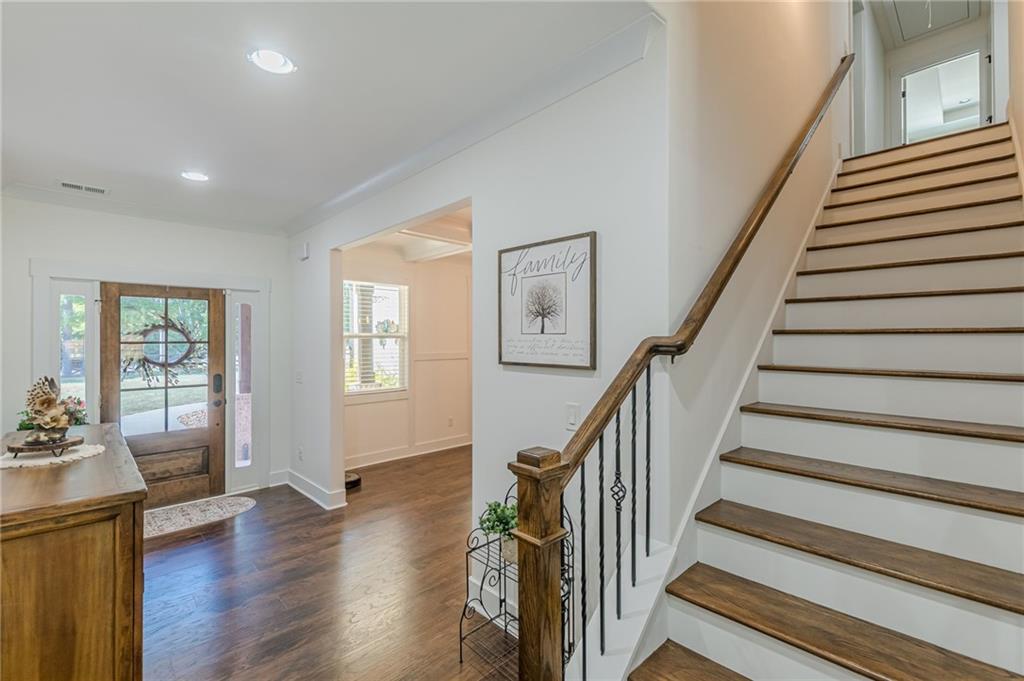 21 Lovell Road Temple, GA 30179 - Photo 8 of 77 a view of a livingroom with wooden floor and stairs