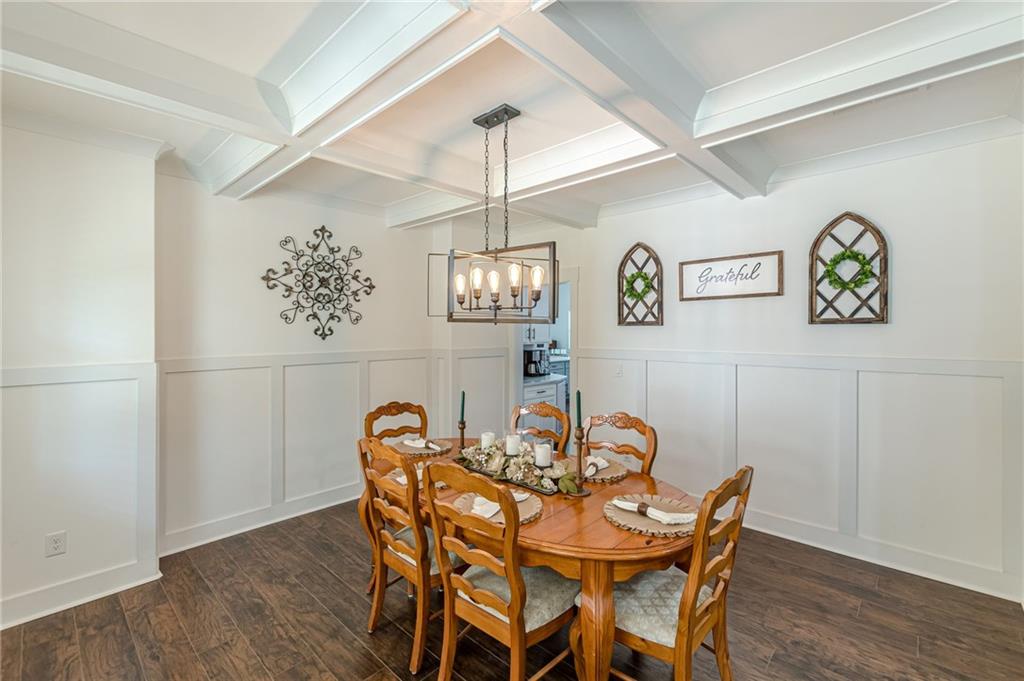 21 Lovell Road Temple, GA 30179 - Photo 10 of 77 a view of a dining room with furniture and wooden floor